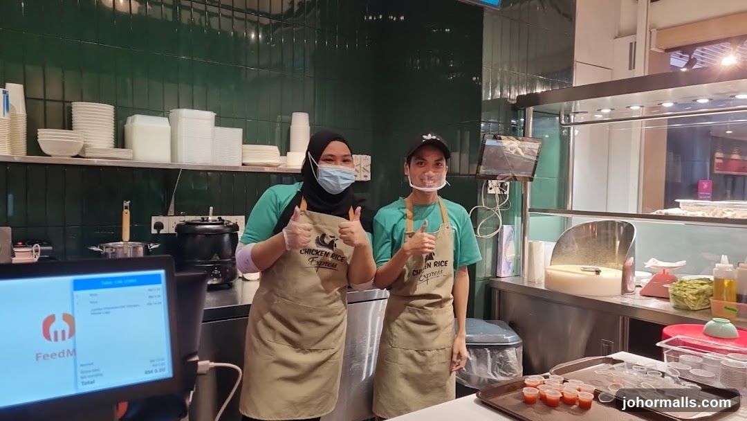 Staff at Chicken Rice Express counter