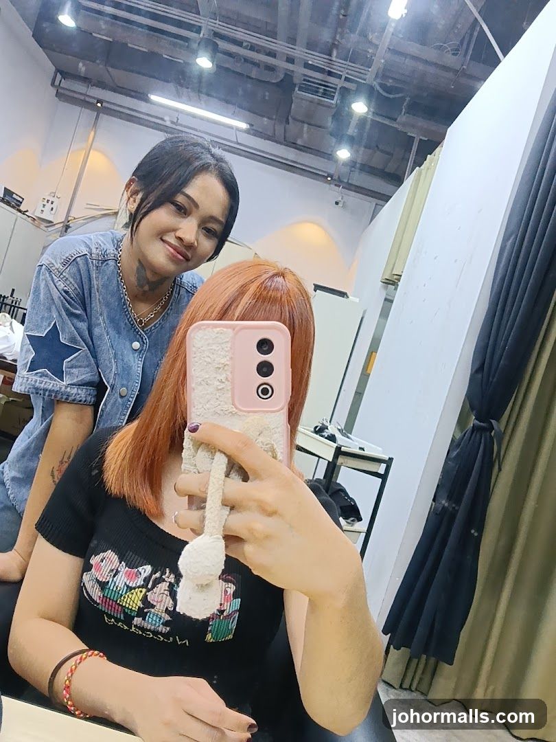 Interior selfie at a salon or studio