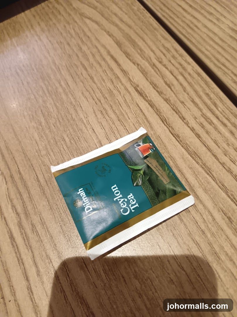 Tea bag on wooden surface