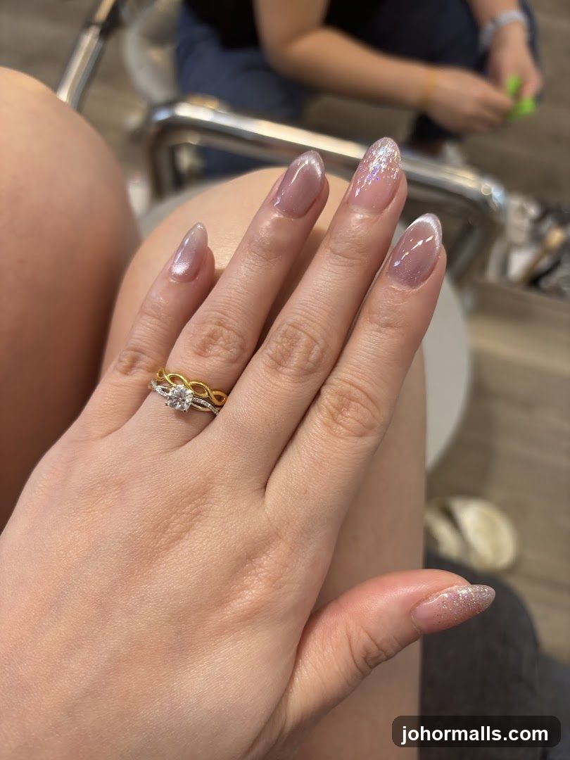 Hand with manicure and ring