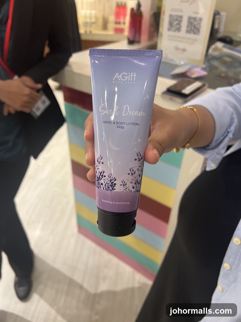 Hand holding lotion product