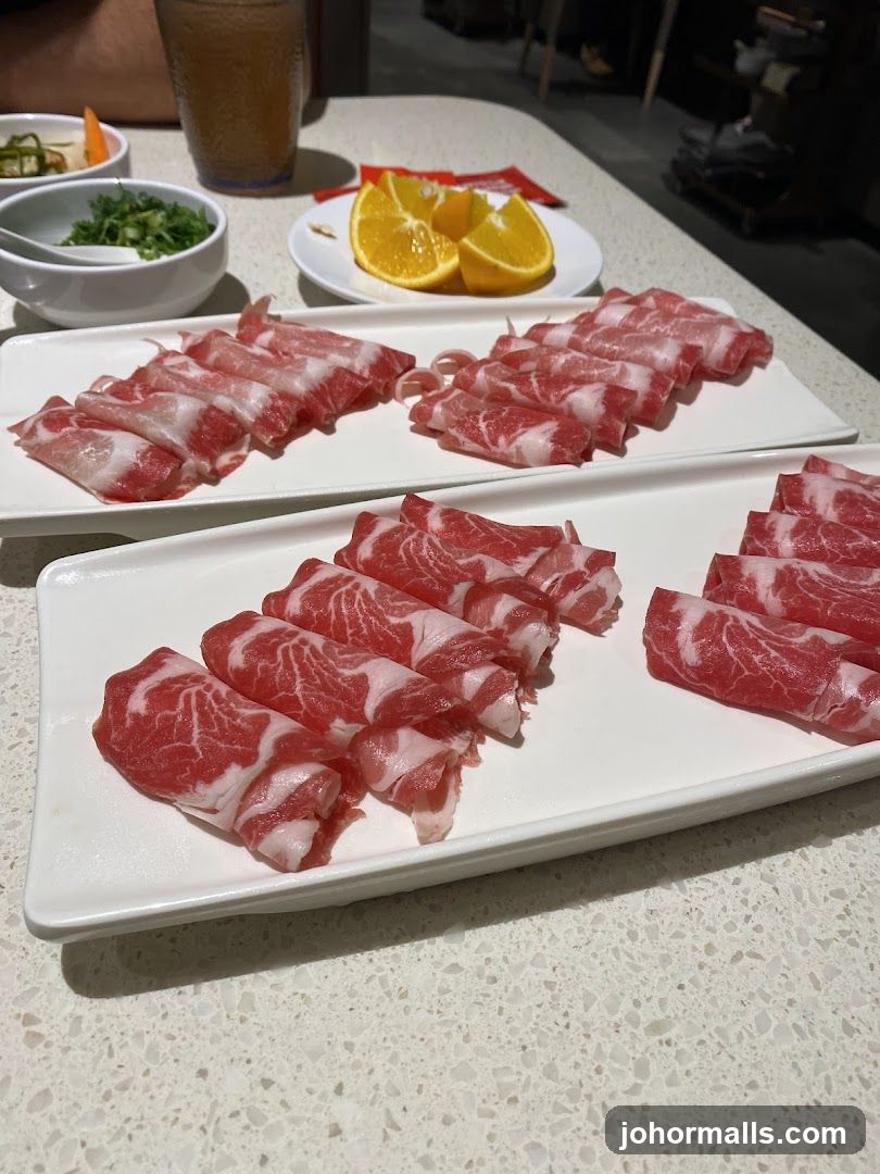 Thinly Sliced Meat and Oranges