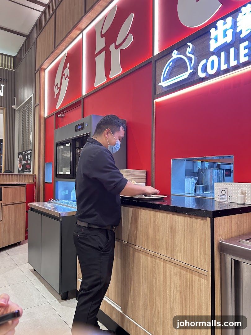 Staff preparing food at a counter