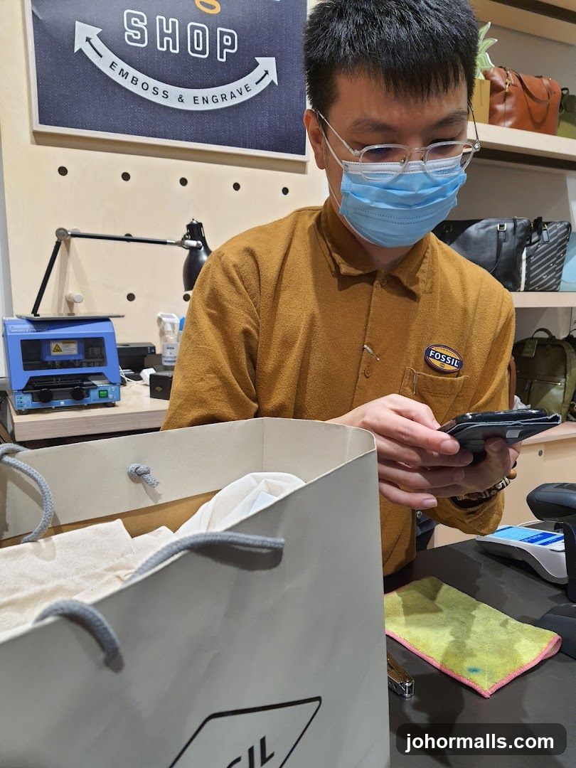 Man at Counter with Fossil Bag