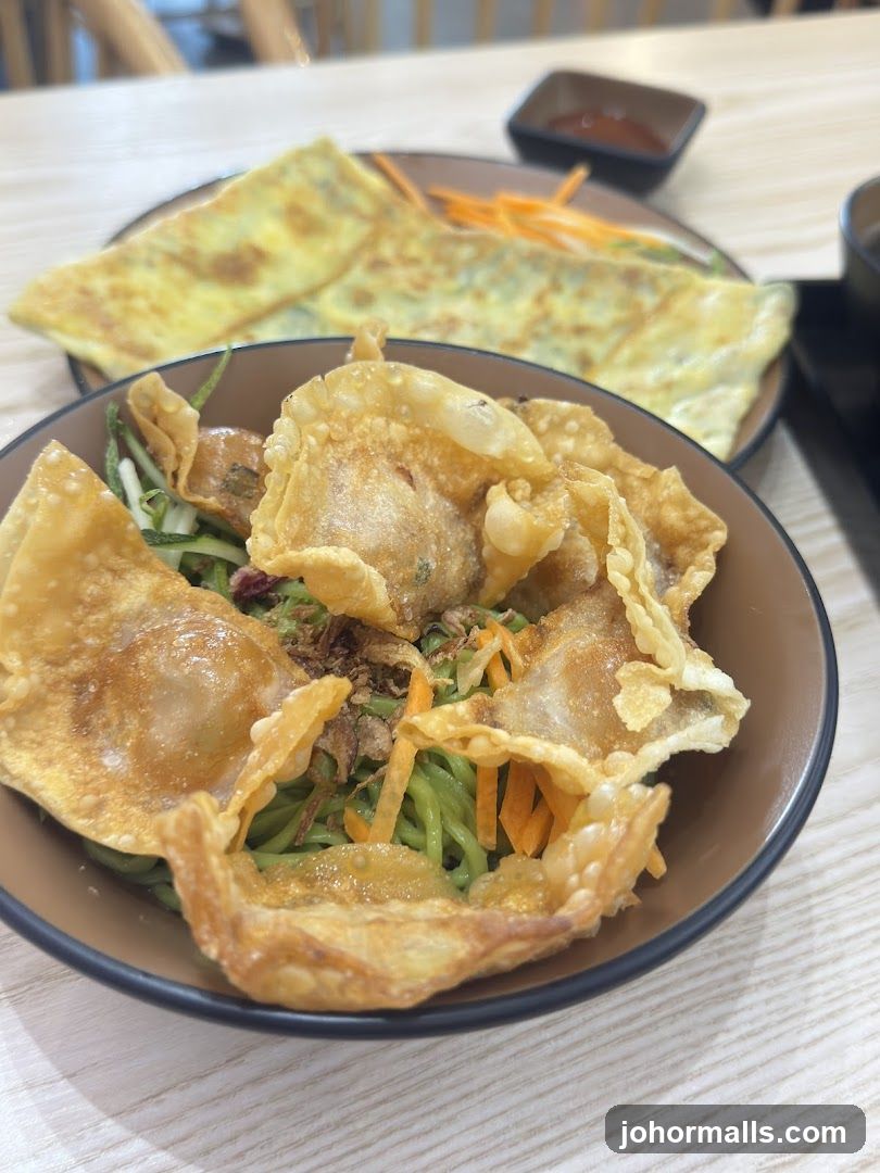 Noodle Dish with Crispy Wontons