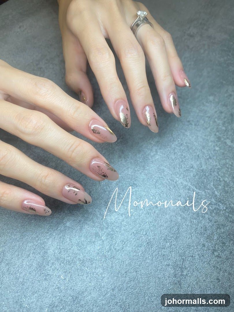 Nails with gold leaf accents