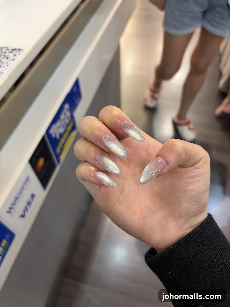 Woman's Hand with Stiletto Nails