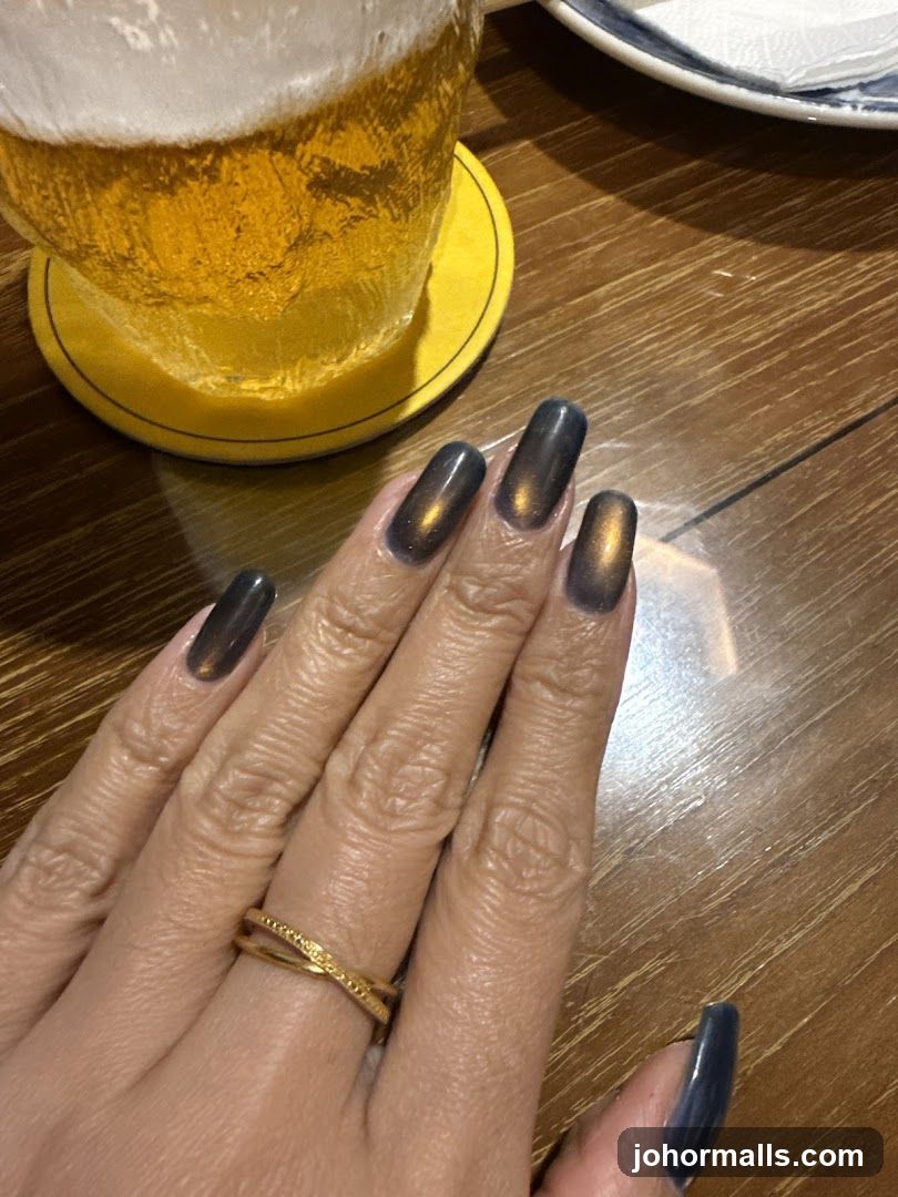 Hand with beer and ring