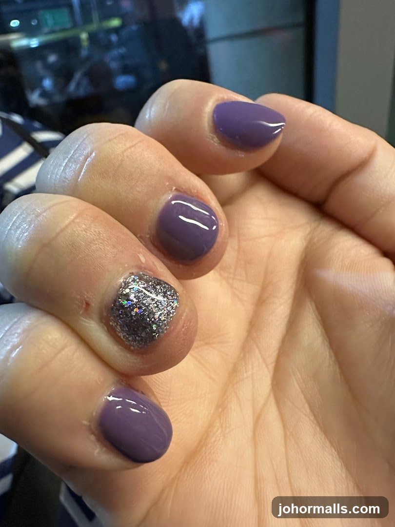 Purple Nails with Glitter Accent