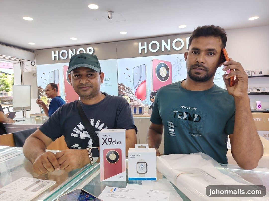 Two men in a phone store