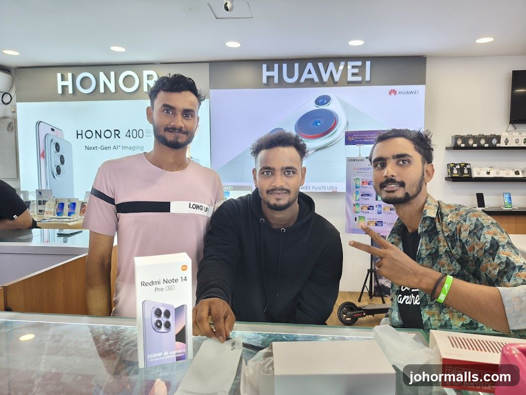 Three men in a phone store