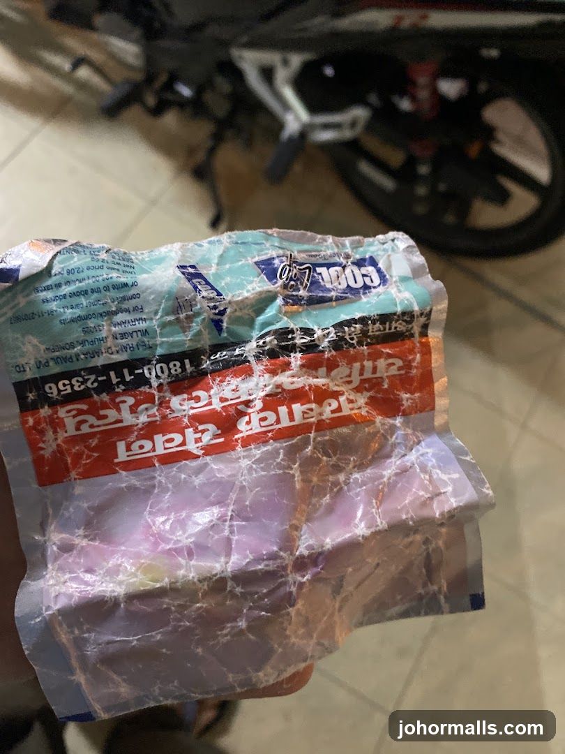 Crumpled Packaging with Text