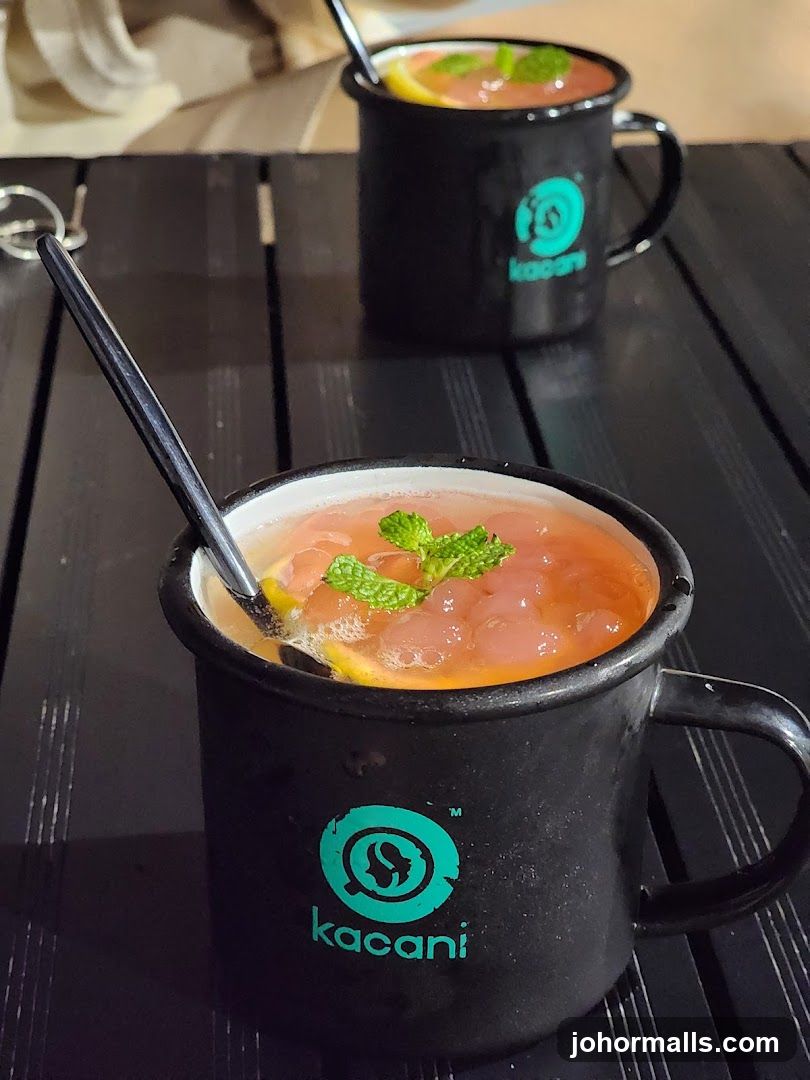 Two drinks with mint and lemon