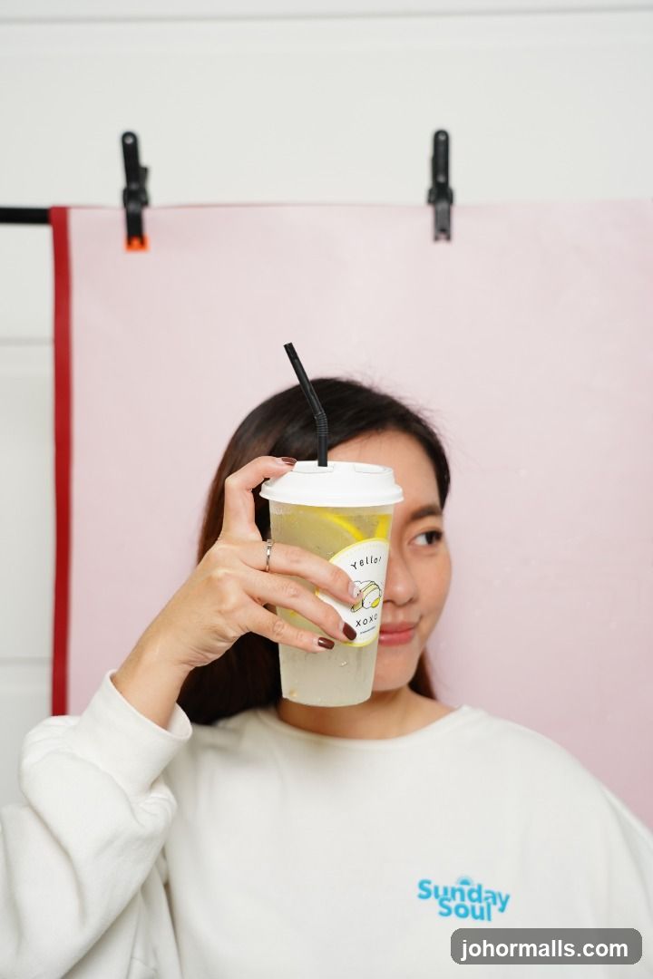 Woman holding a drink