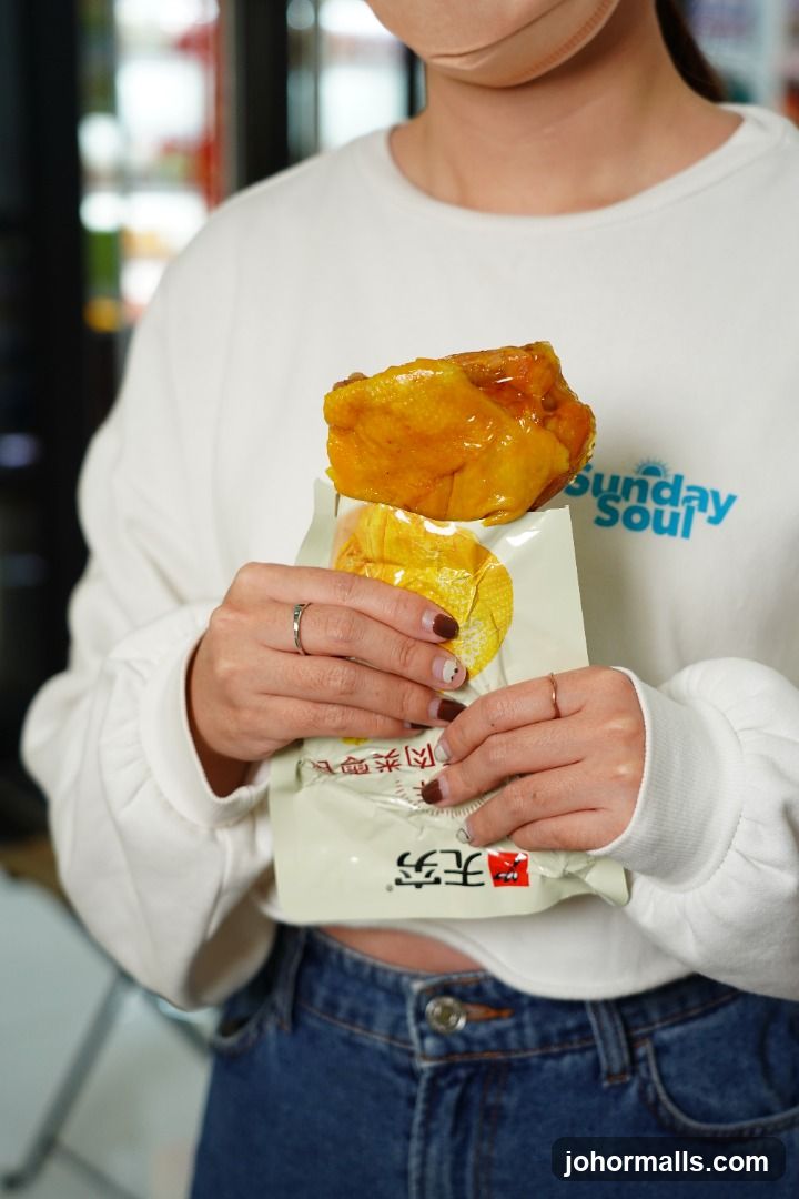Person holding a snack