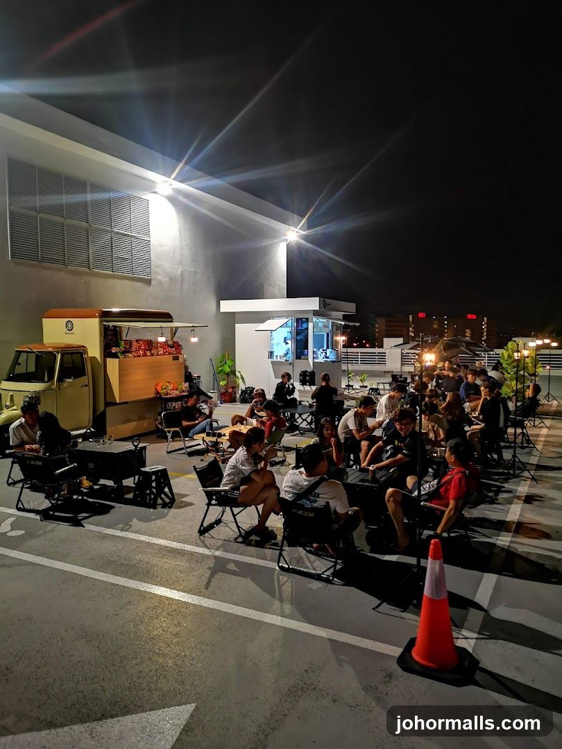 Outdoor seating area with food truck