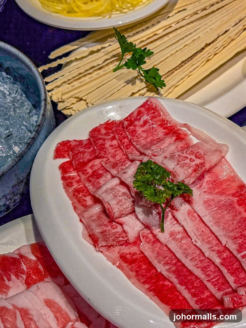 Thinly Sliced Raw Meat and Noodles