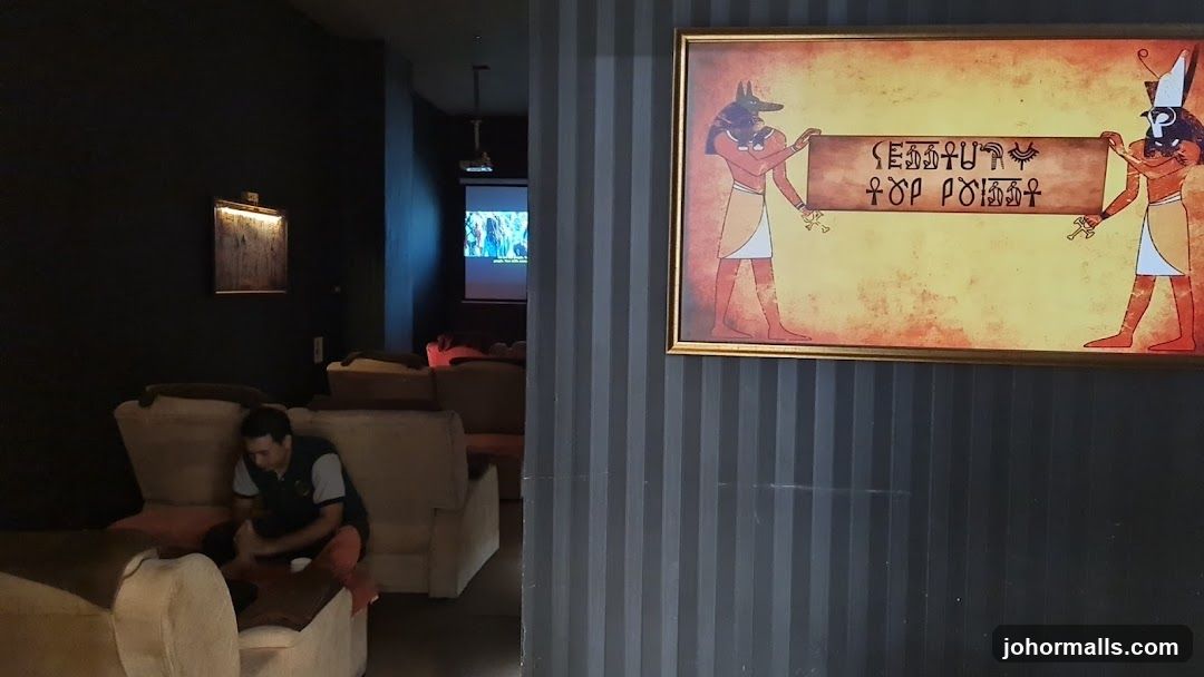 Massage chairs and Egyptian-themed art