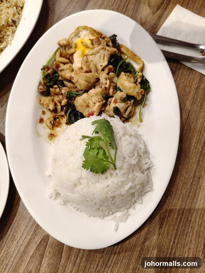 Chicken with Basil and Fried Egg over Rice