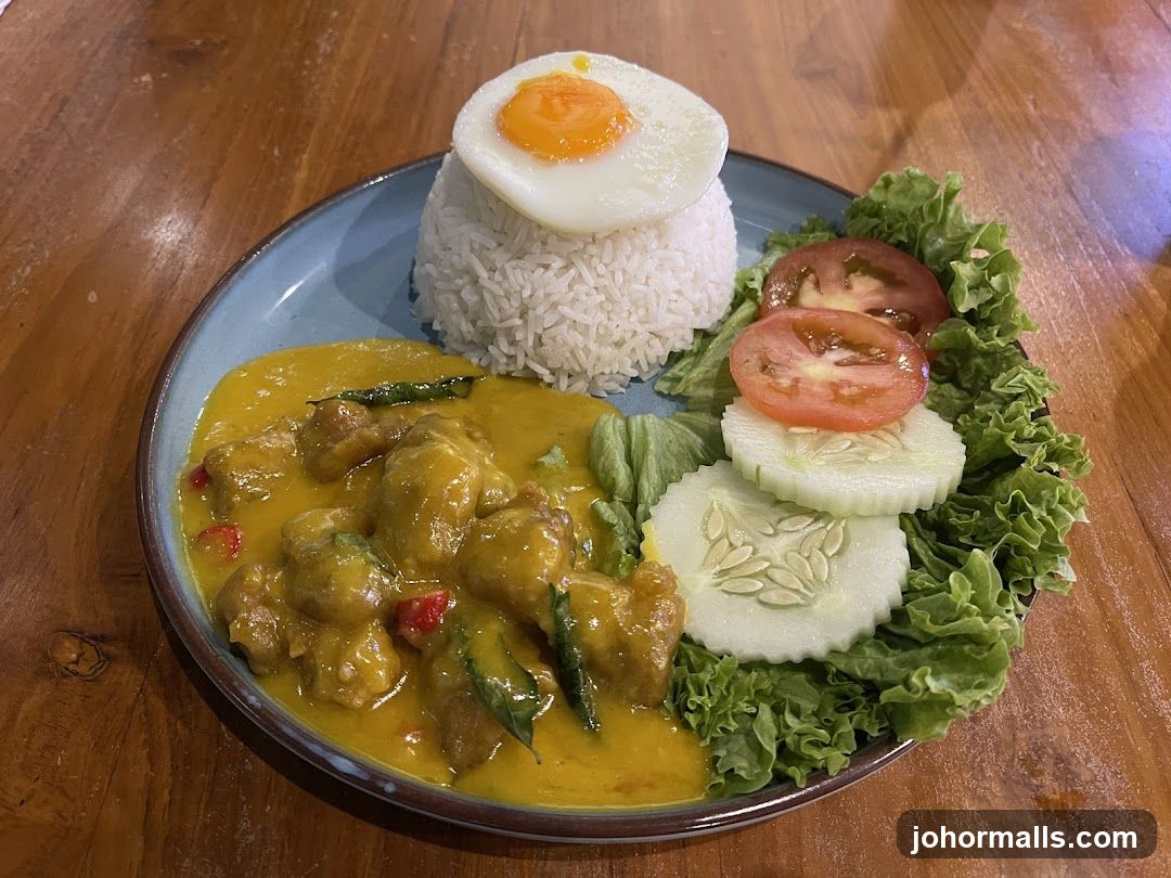 Curry dish with rice and egg