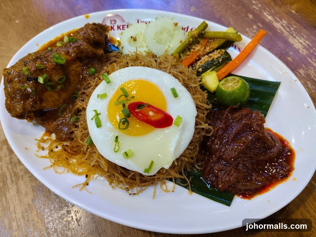 Nasi Lemak with Fried Egg and Chicken
