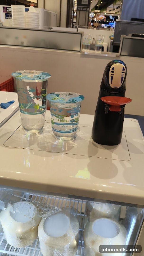 No-Face figure with drinks and coconuts
