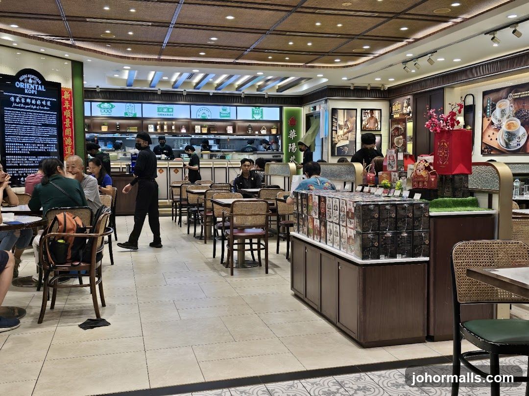 Interior of a cafe with seating and display shelves