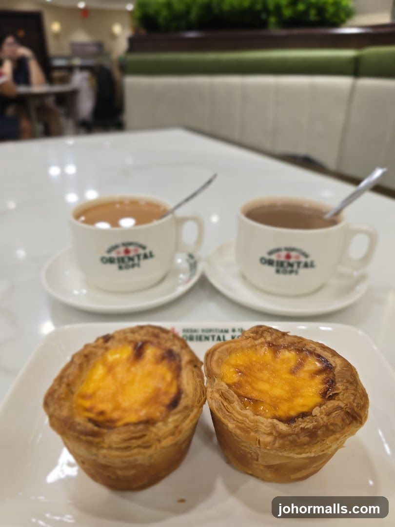 Two Egg Tarts and Two Cups of Coffee