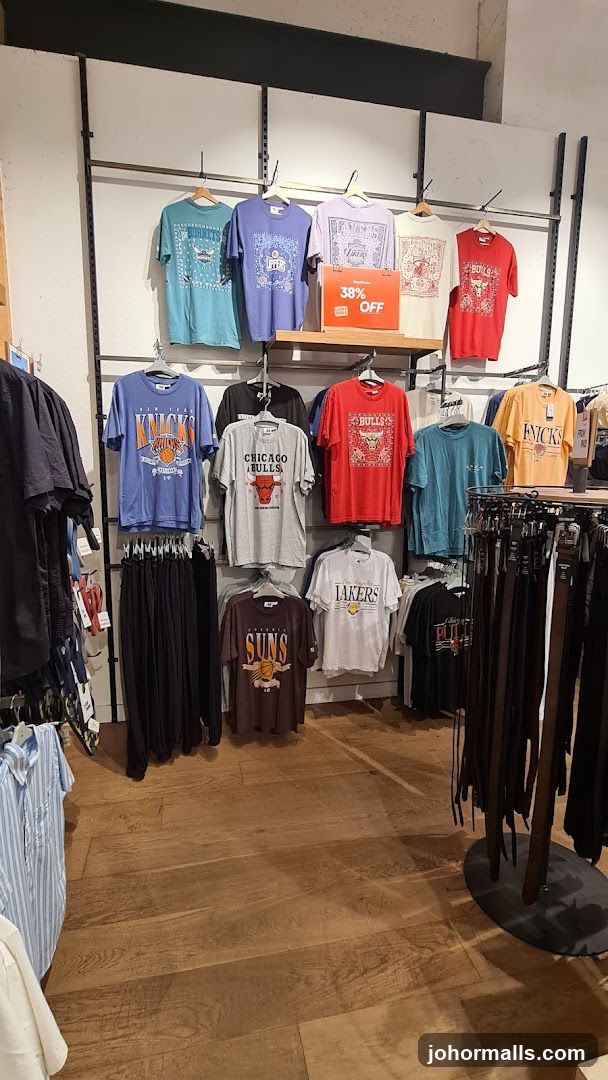 T-shirt display with sale sign