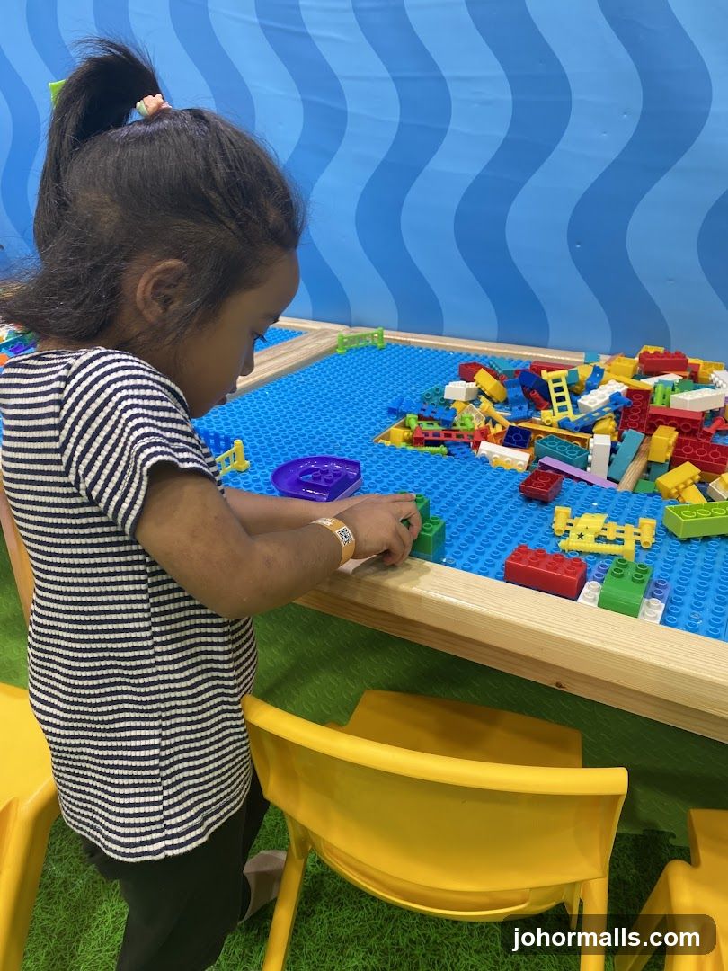 Child playing with building blocks