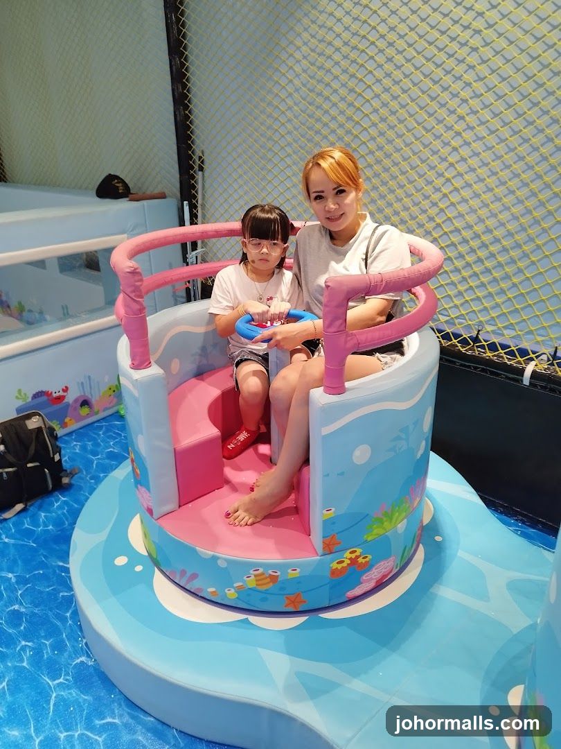 Mother and daughter in a themed ride