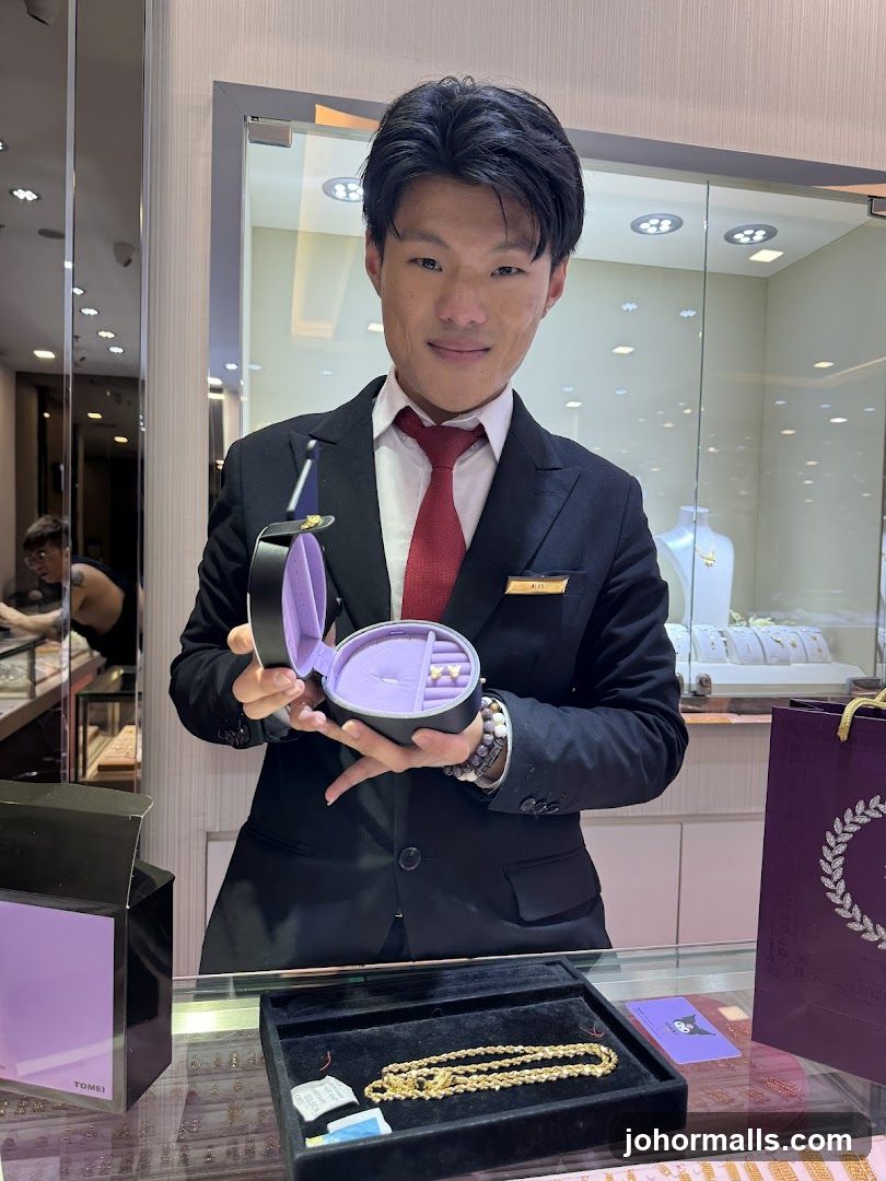 Jewelry Store Employee Showing Jewelry