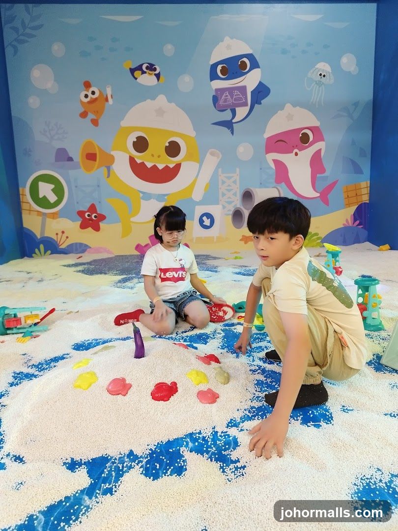 Children Playing in a Ball Pit with Baby Shark Theme