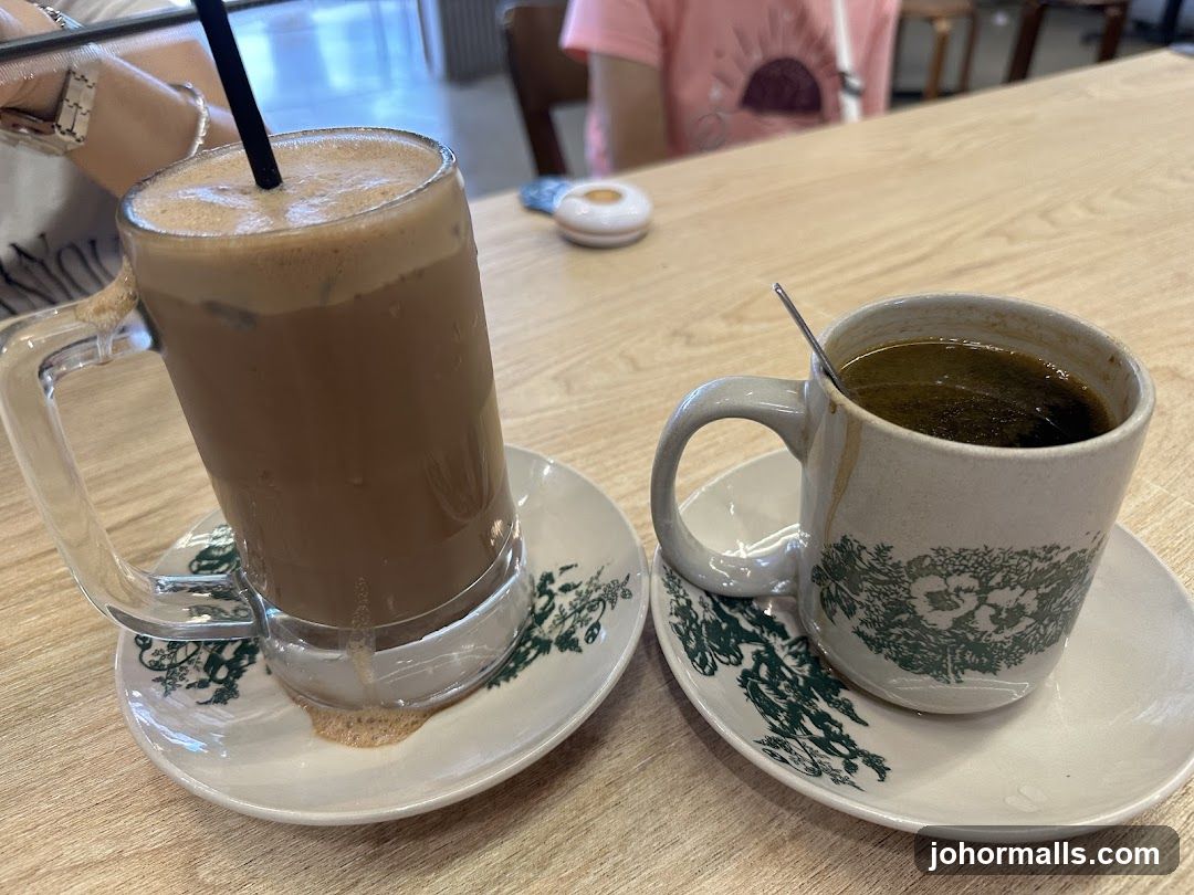 Two coffee drinks on a table