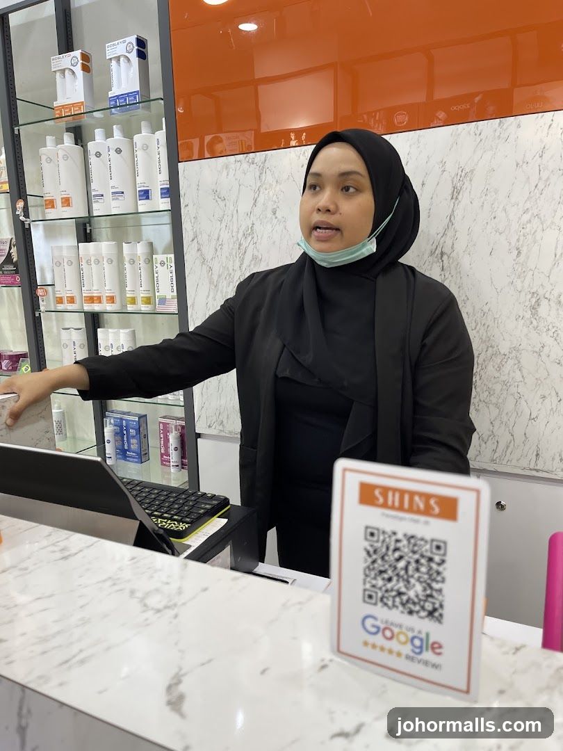 Staff member at counter