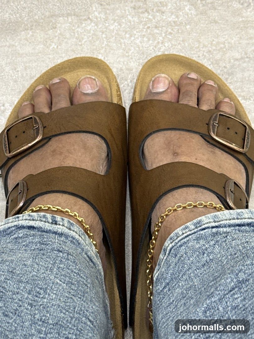 Feet in Sandals and Jeans