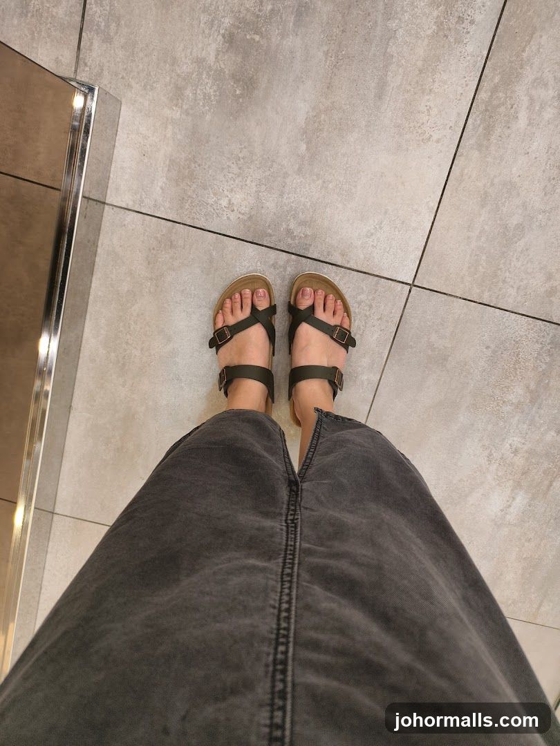 Feet in Sandals and Skirt