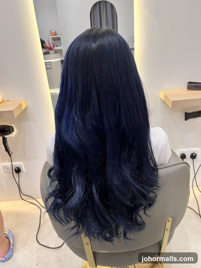 Woman with dark blue hair