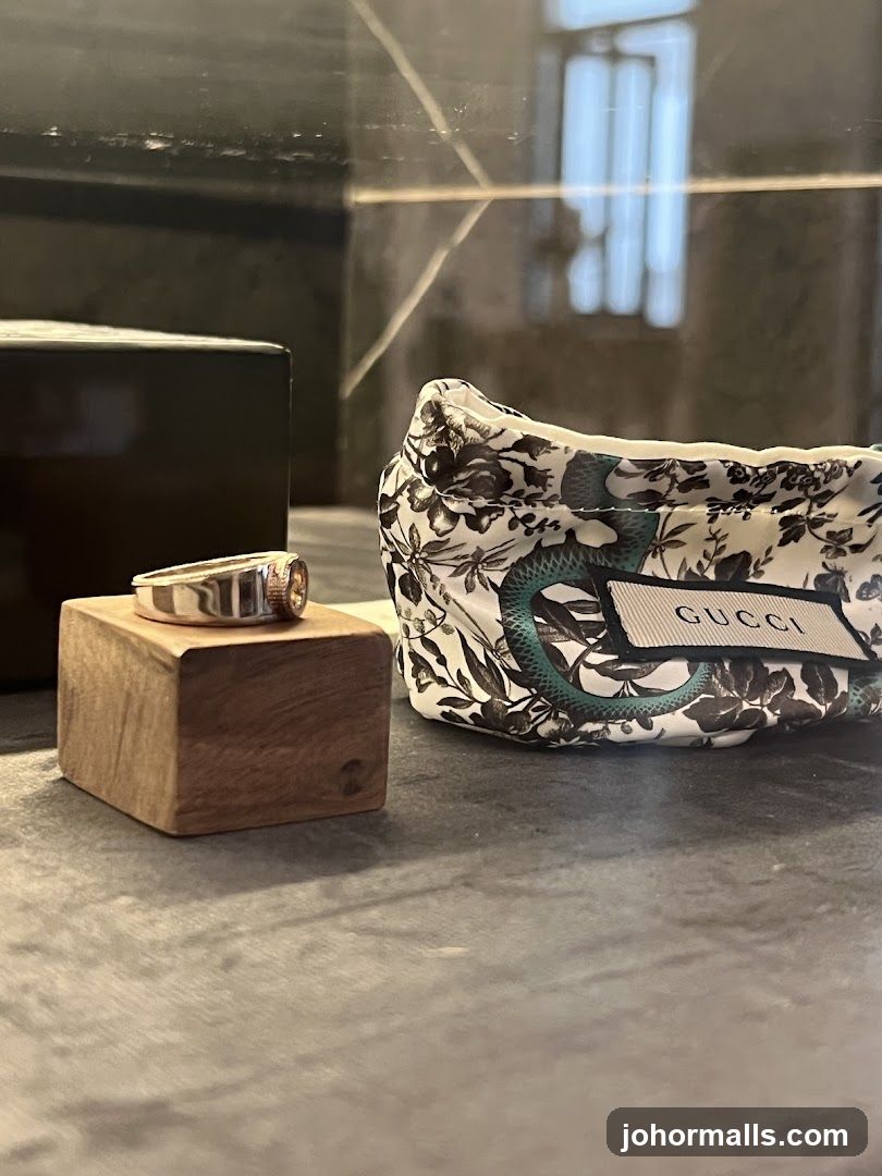 Ring and Gucci Pouch