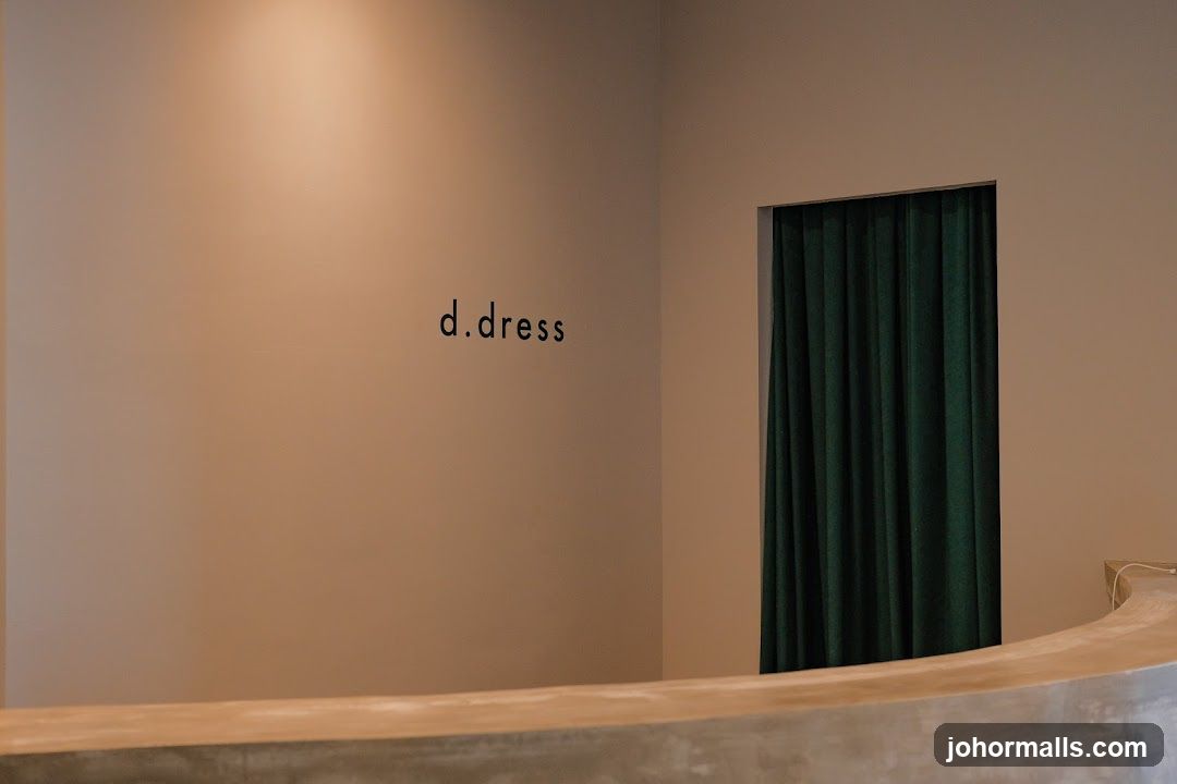 Interior of a store with a logo and a curtained doorway