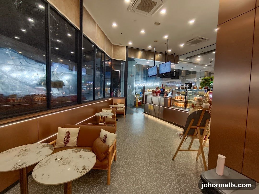 Cafe Interior with Seating and Display Counter