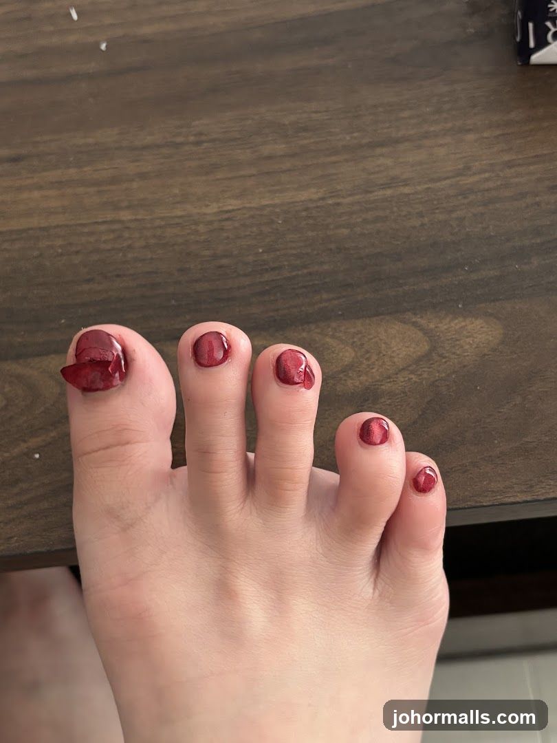 Toes with Burgundy Nail Polish