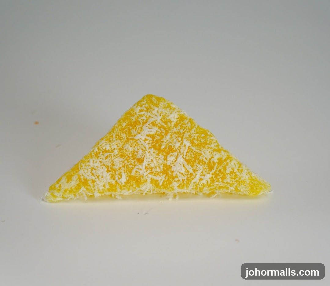 Triangle pastry with shredded coconut