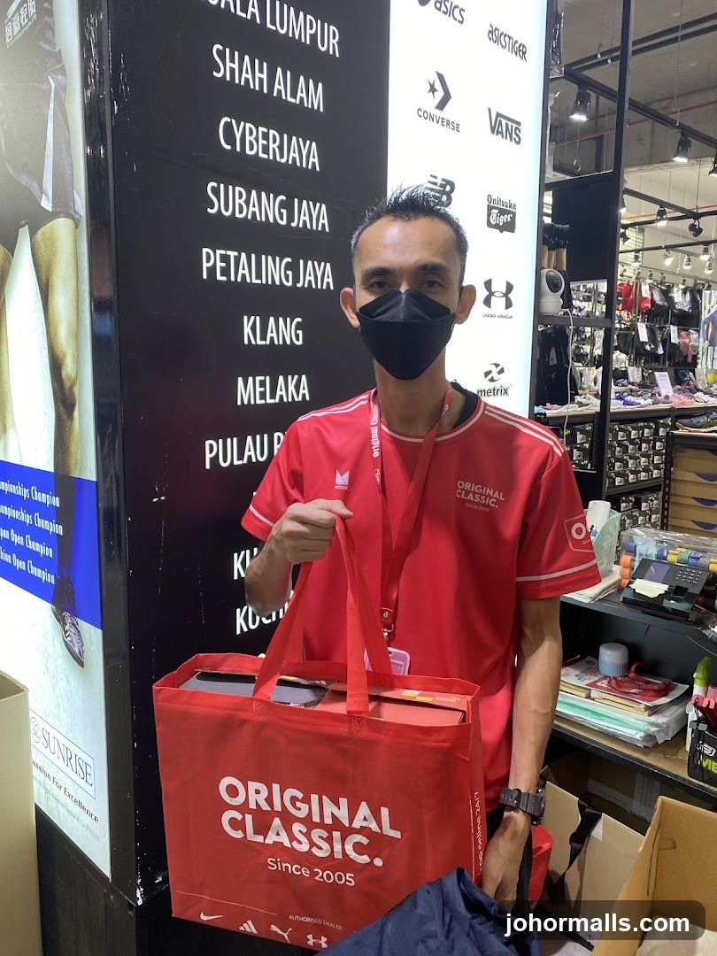 Man holding a shopping bag