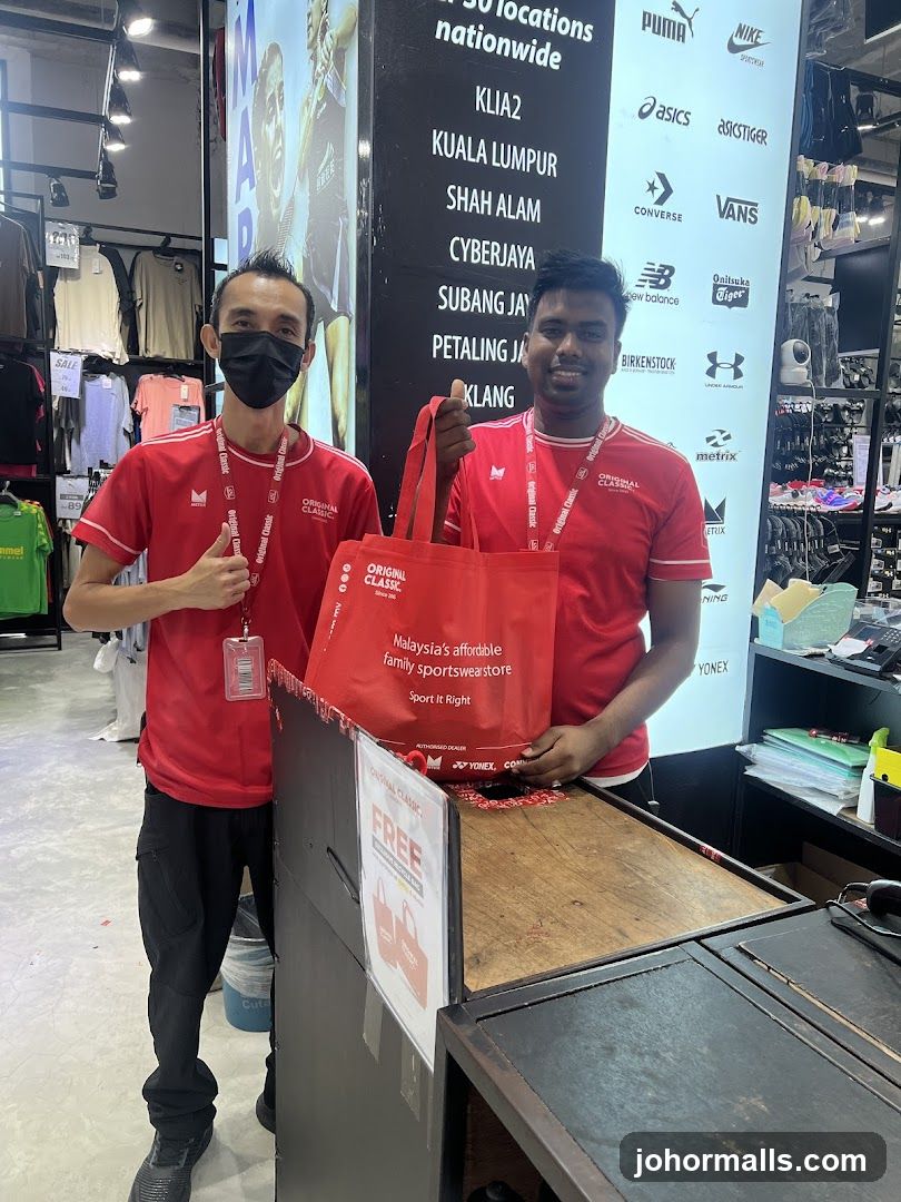 Store Employees with Branded Bag