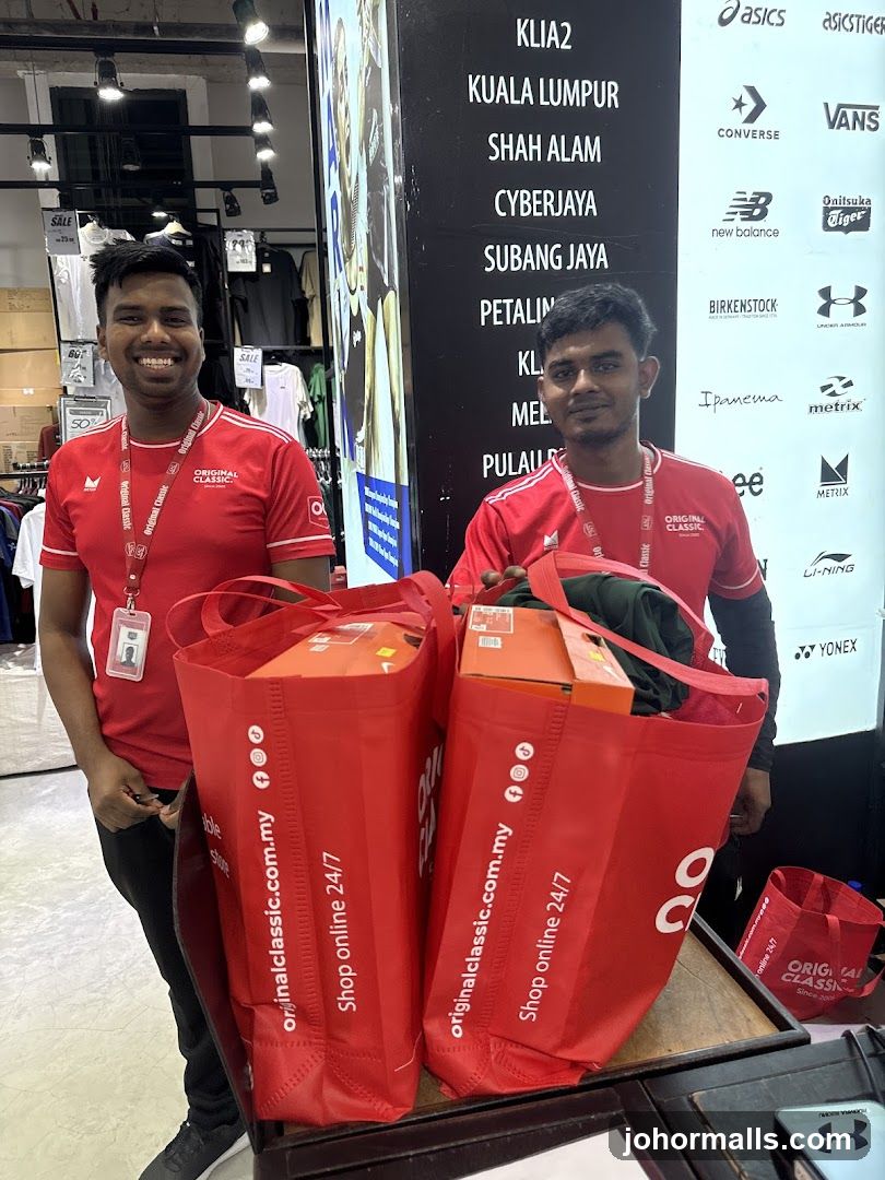 Store Employees with Shopping Bags