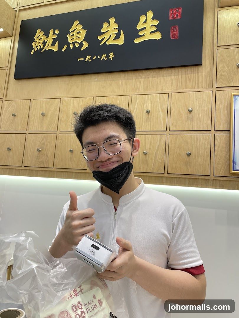 Man holding a payment terminal