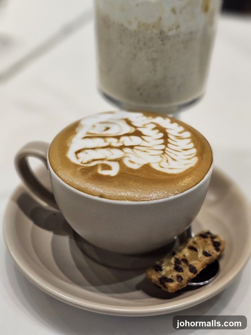 Latte with Latte Art and Cookie