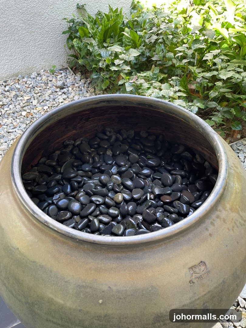 Large Pot with Black Stones