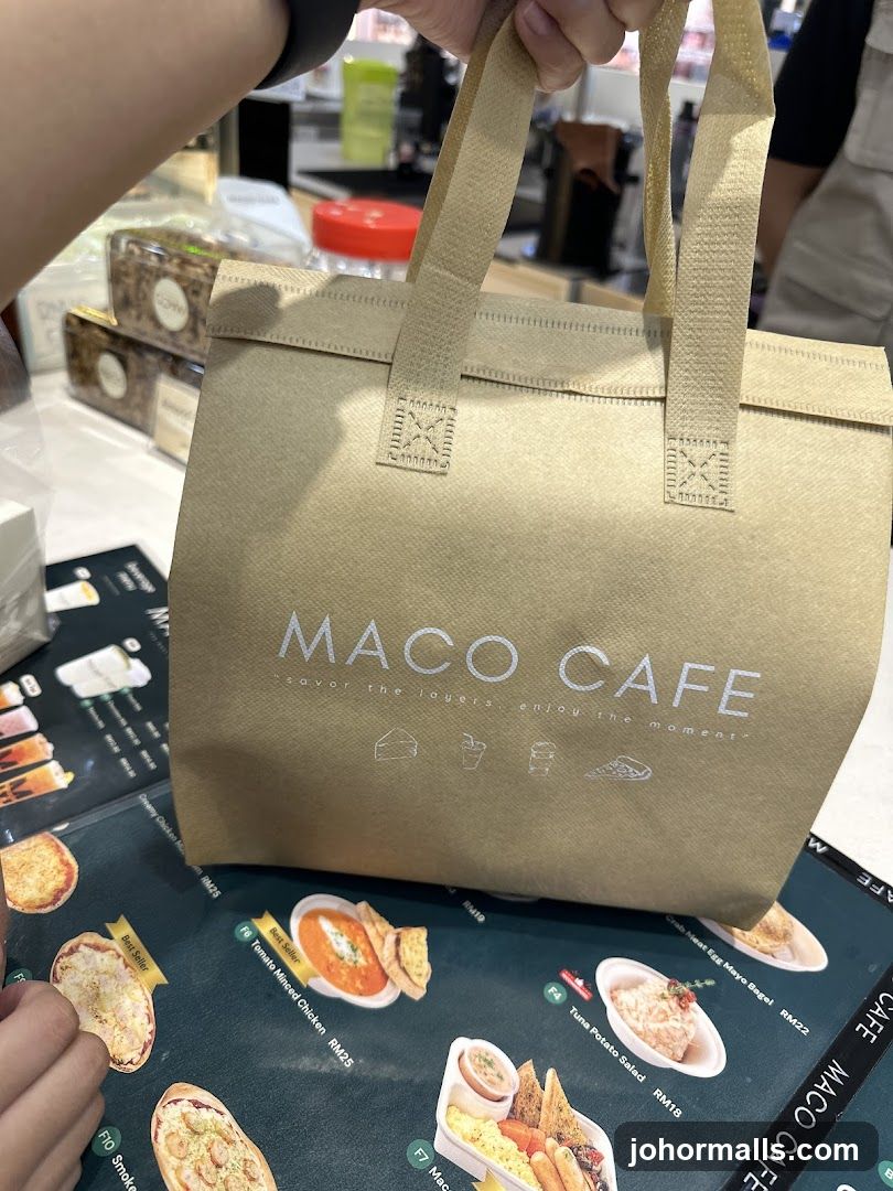 Bag with cafe logo and menu